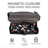 black treat pouch with a black patterned treat pocket, magnetic closure feature highlighted.