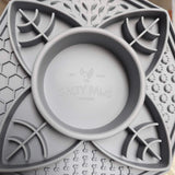 Close up of Lotus Slow Feeder centre bowl with Salty Paws Designs branding embossed