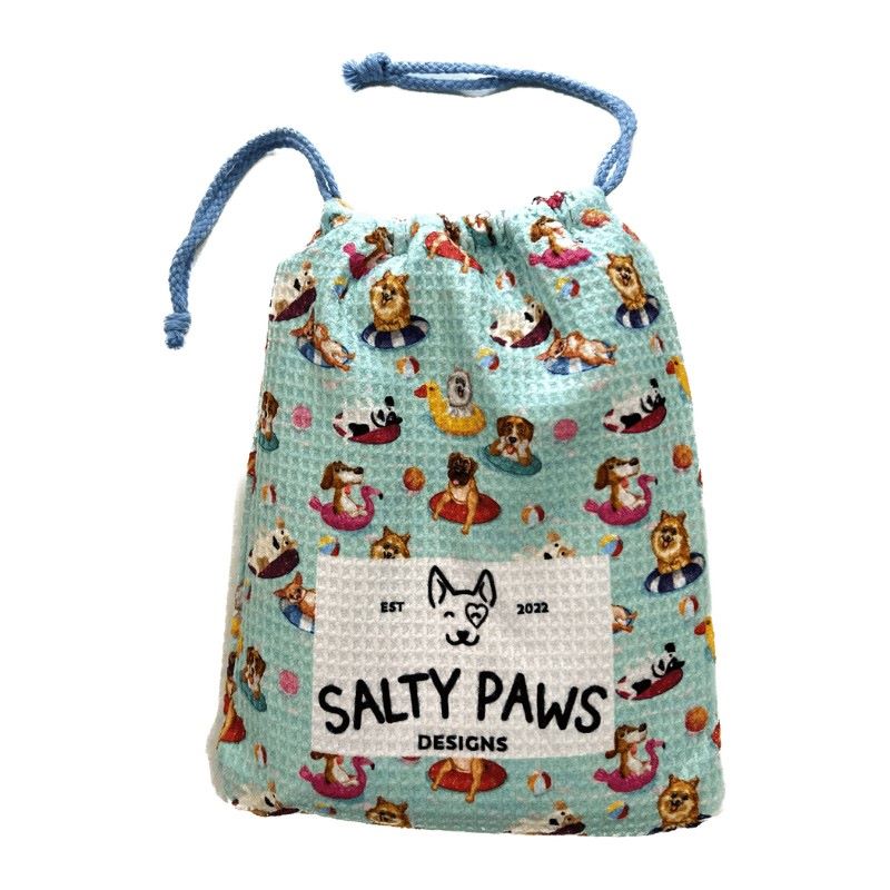 Salty Paws Designs Pool Party adventure dog towel in aqua stored in its matching drawstring carry bag