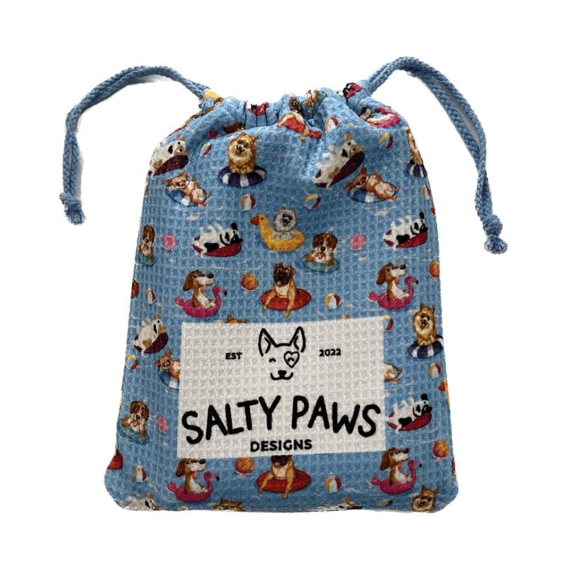 Salty Paws Designs Pool Party compact dog towel in blue packed into its matching drawstring carry bag