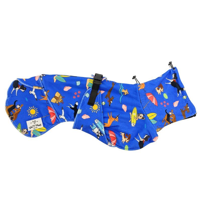 Salty Paws Dog Drying Coat in blue beach dog print flat lay showing adjustable chest clip and Salty Paws label