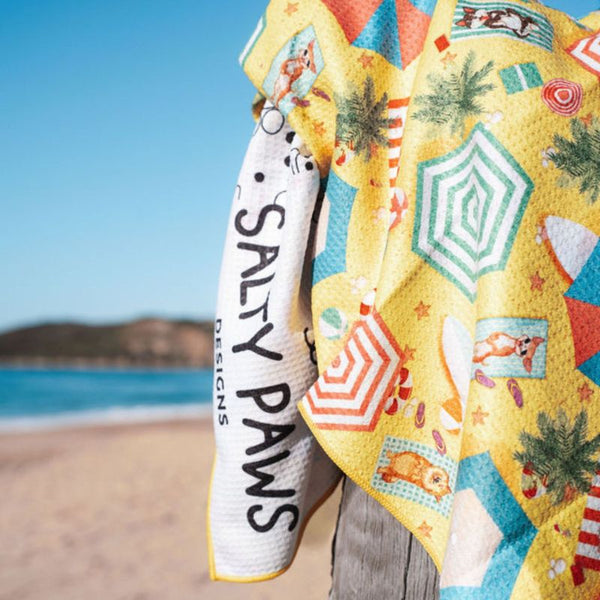 Salty Paws Designs Life's a Beach adventure towel in yellow unfolded showing full beach umbrella print and white paw print reverse side