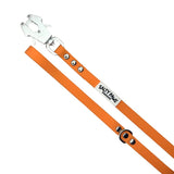Salty Paws quick release waterproof dog lead in peach, coiled view showing brand label and frog clip hardware