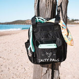 Salty Paws Silicone Treat Pouch insert stored in Ultimate Adventure Grab Bag at the beach