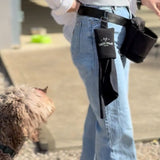 Salty Paws Slobber Towel clipped to Dog Training Treat Pouch worn on belt during outdoor dog training session