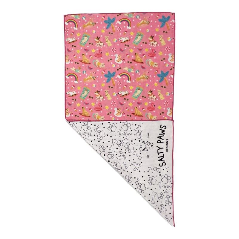 Salty Paws Summer Days Adventure Dog Towel in pink folded showing colourful front print and white paw print reverse