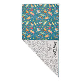 Salty Paws Summer Days Adventure Dog Towel in teal folded showing colourful front print and white paw print reverse