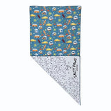 Salty Paws Surf's Up Adventure Dog Towel in teal folded showing surf print front and white paw print reverse