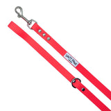Salty Paws waterproof dog lead in coral with silver snap hook, diagonal flat lay