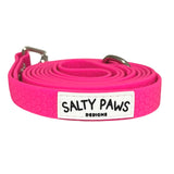 Salty Paws waterproof long line dog lead in hot pink, coiled with silver hardware