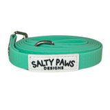 Salty Paws waterproof long line dog lead in seafoam green, coiled with silver hardware