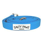 Salty Paws waterproof long line dog lead in sky blue, coiled with silver hardware