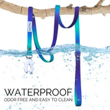Salty Paws waterproof quick release dog lead in blue purple green gradient shown with water splash, waterproof, odor free and easy to clean