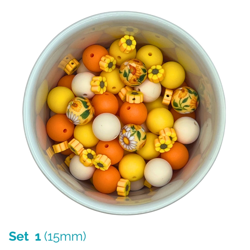 Assorted colorful beads in a white container with 'Set 1 (15mm)' text.