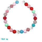 Colorful beaded dog necklace with various patterns on a white background