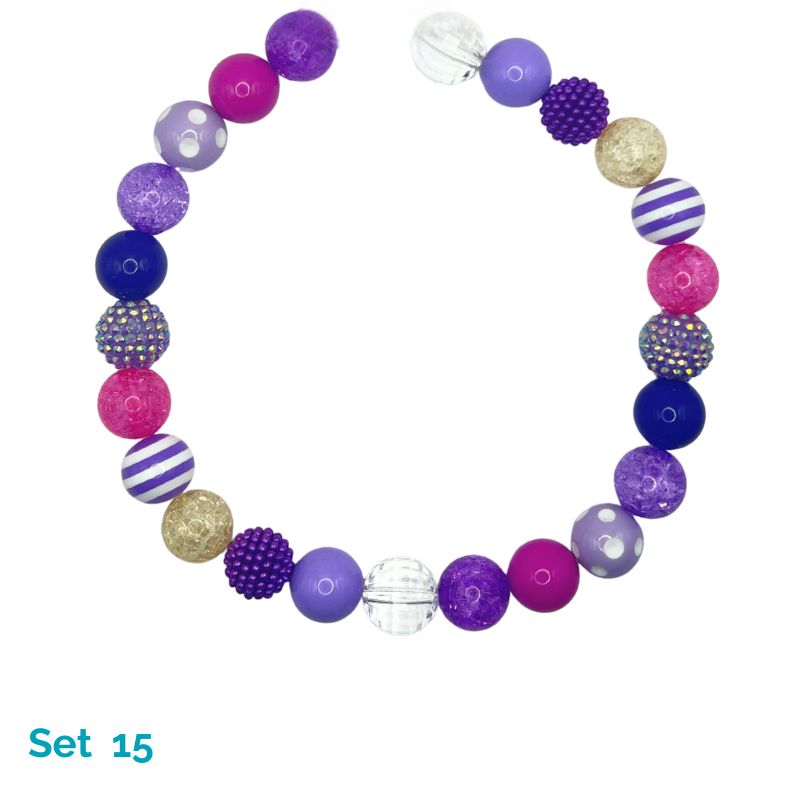 Colorful beaded dog necklace with various patterns on a white background