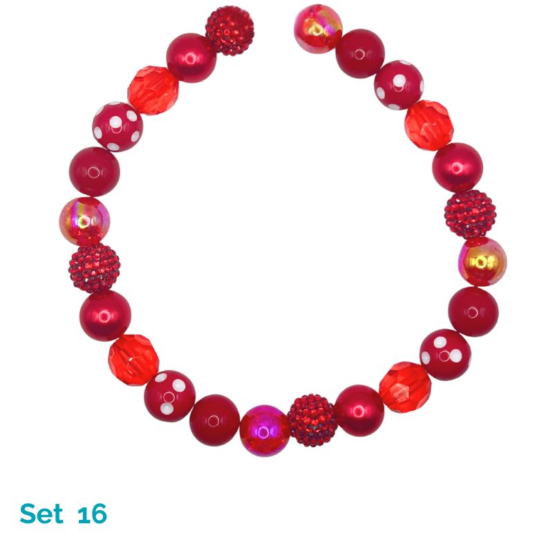 Red beaded dog necklace on a white background