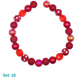 Red beaded dog necklace on a white background