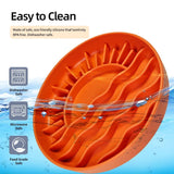 Sunset Slow Feeder in orange showing dishwasher safe microwave safe and food grade silicone features